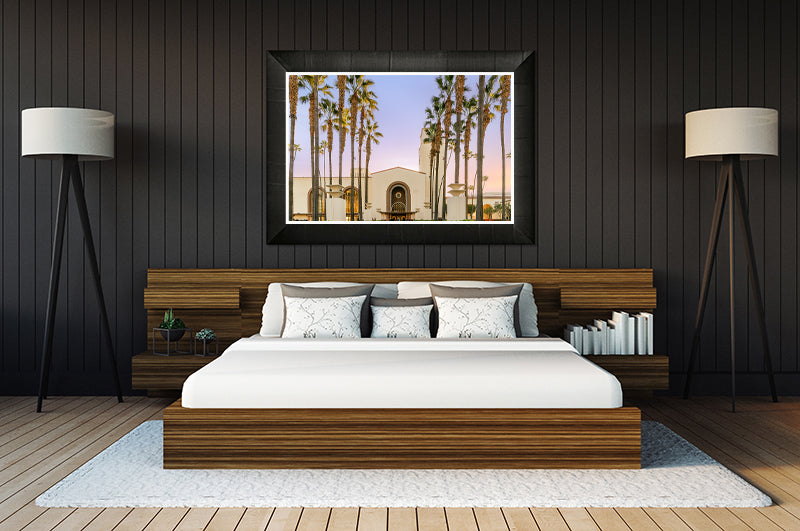 Frame print of sunrise over union station hanging over mastered suite