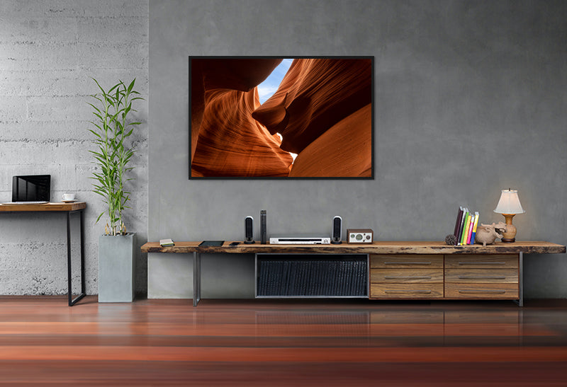 framed print hanging on wall of lower antelope slot canyon