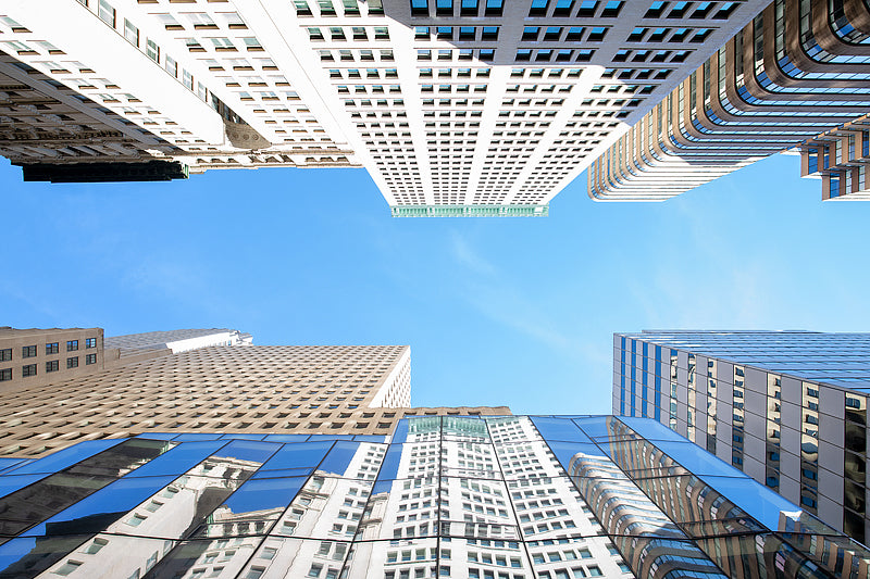 Looking straight up at the manhattan skyline