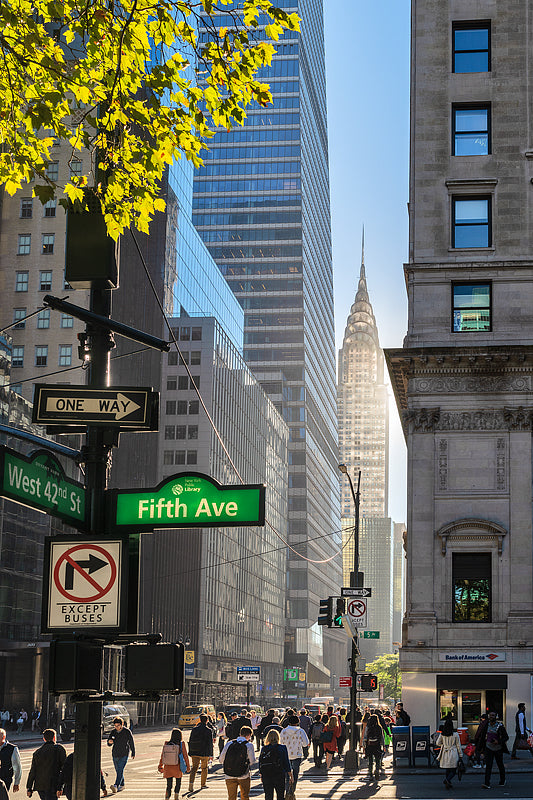 looking down 42nd st at 5th avenue manhattan in the early morning light at the Chrysler Building