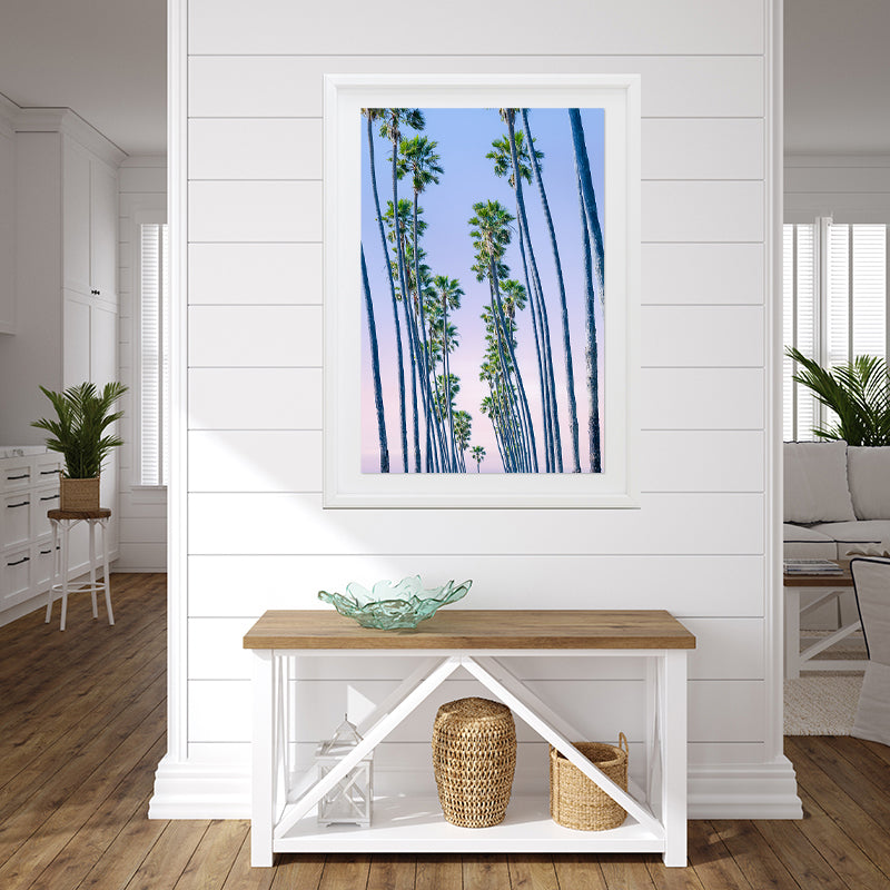 Framed print of California palms trees on wall of Hamptons style home