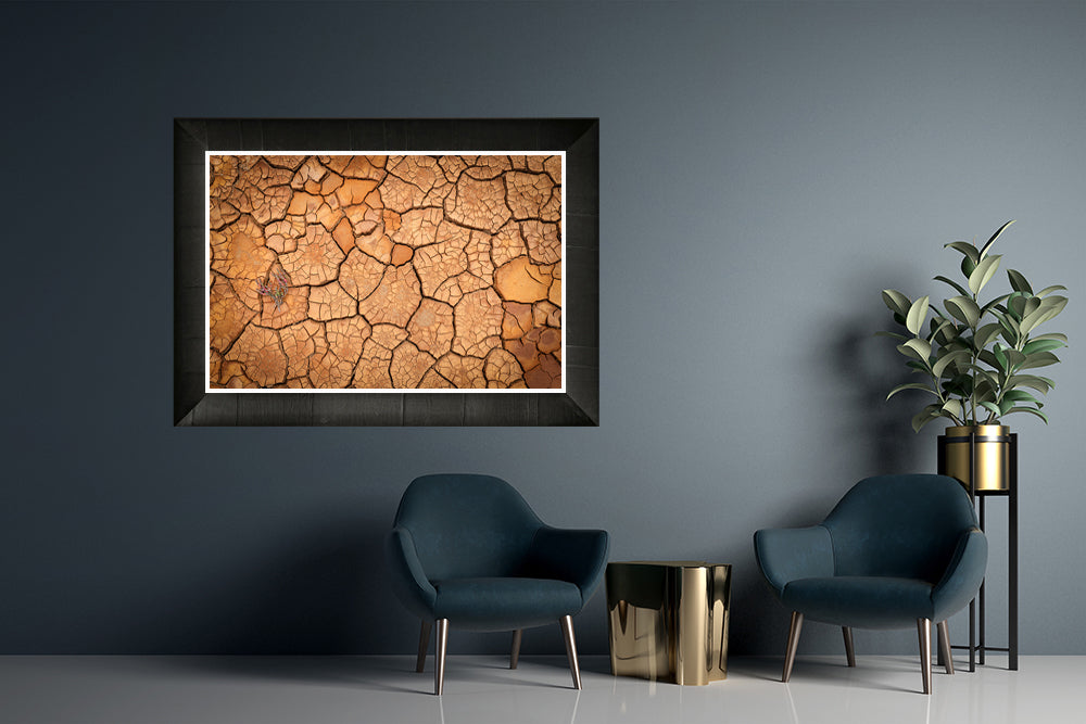 Large print of cracked and textures dry creek bed of western australia