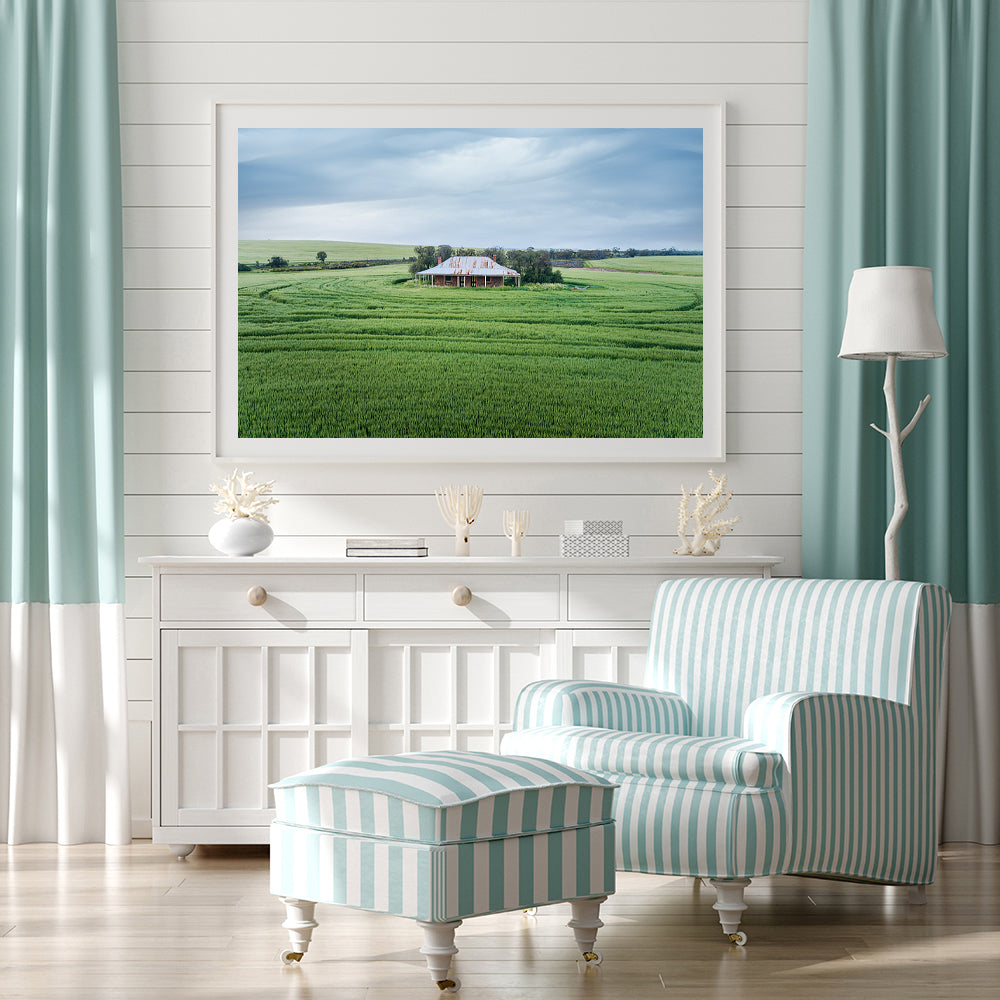Framed print of an Aussie farmhouse in the middle of a lush green field