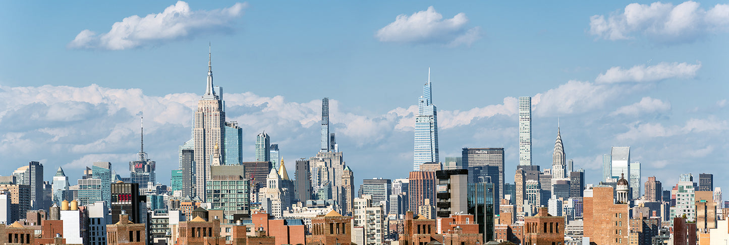 Daytime view over midtown manhattan with the empire state building and Chrysler Building in NYC