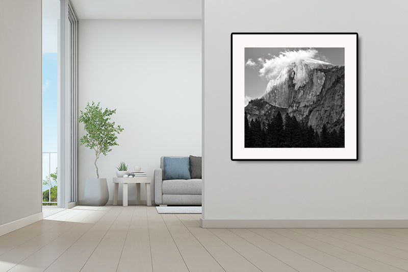 Print of half dome on wall in home