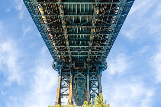 Under the manhattan bridge with blue skies