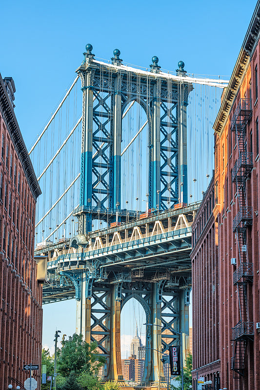 The Manhattan Bridge Tower and Empire State Building from Dumbo Brooklyn