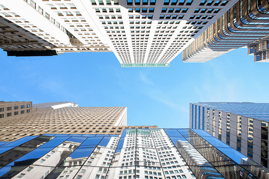 Looking straight up at the manhattan skyline