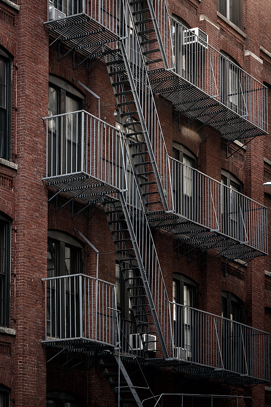 Upclose image of some brooklyn apartments in minimal light